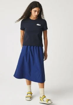 De gros 💯 Lacoste DAMES - T-shirt Imprimé - Bleu Marine 👏