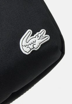 Promo ⌛ Lacoste UNISEX EXCLUSIVE - Sac Bandoulière - Noir Blanc ⌛ -Pas Cher Lacoste Boutique 569688e6cce5417e9a49b4bc7e6faad7