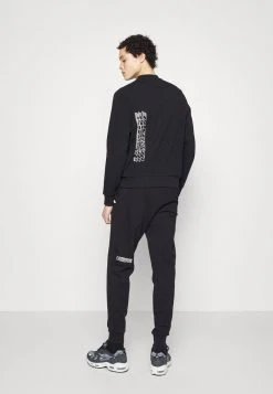 Promo ⭐ Lacoste EXCLUSIVE - Pantalon De Survêtement - Black 😍 -Pas Cher Lacoste Boutique 853ef6f3f369428b83ce060aab8364a6