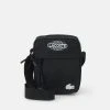 Promo ⌛ Lacoste UNISEX EXCLUSIVE - Sac Bandoulière - Noir Blanc ⌛