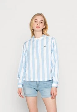 Le moins cher 🔔 Lacoste Blouse - Overview/white ⭐